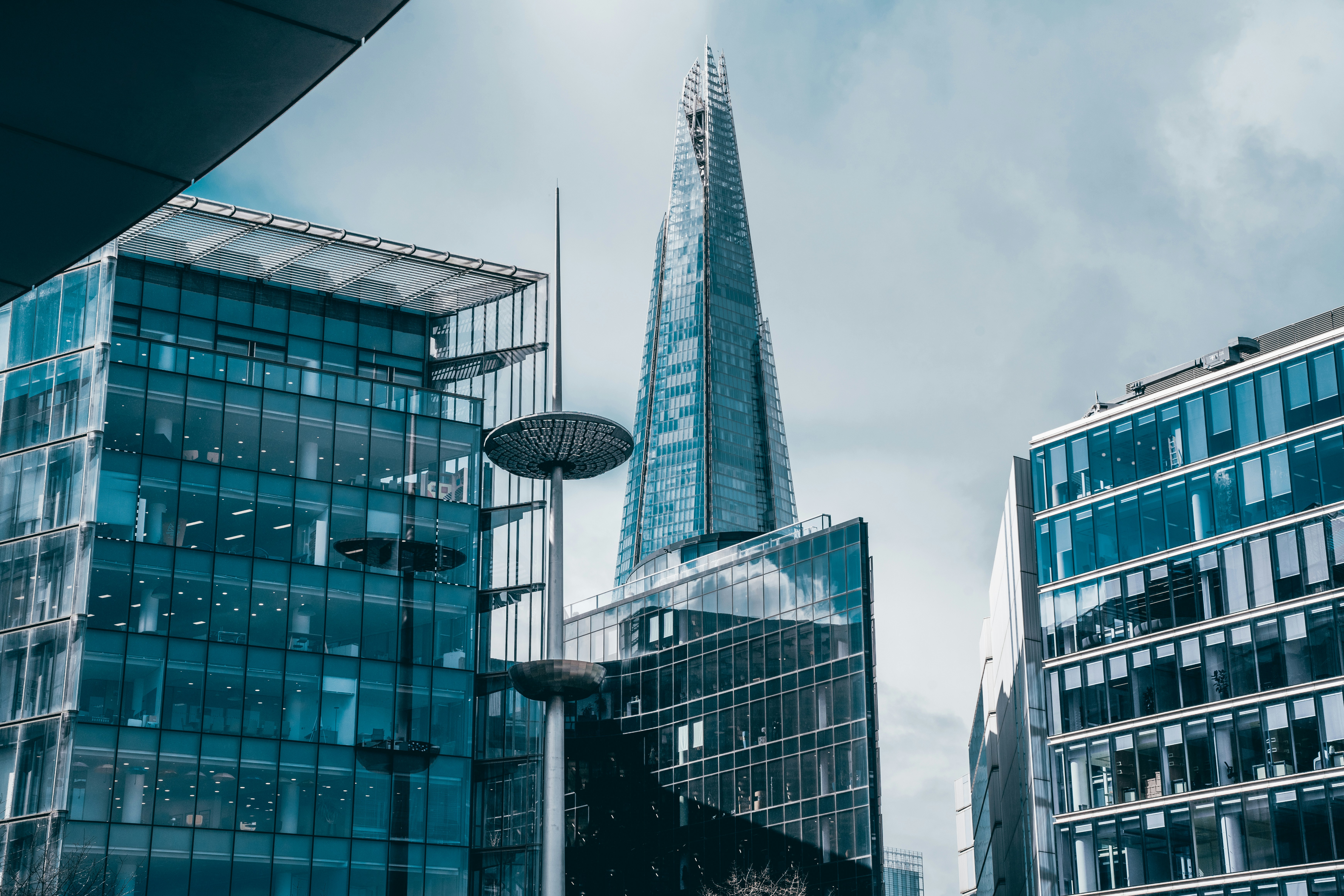 a group of tall buildings next to each other