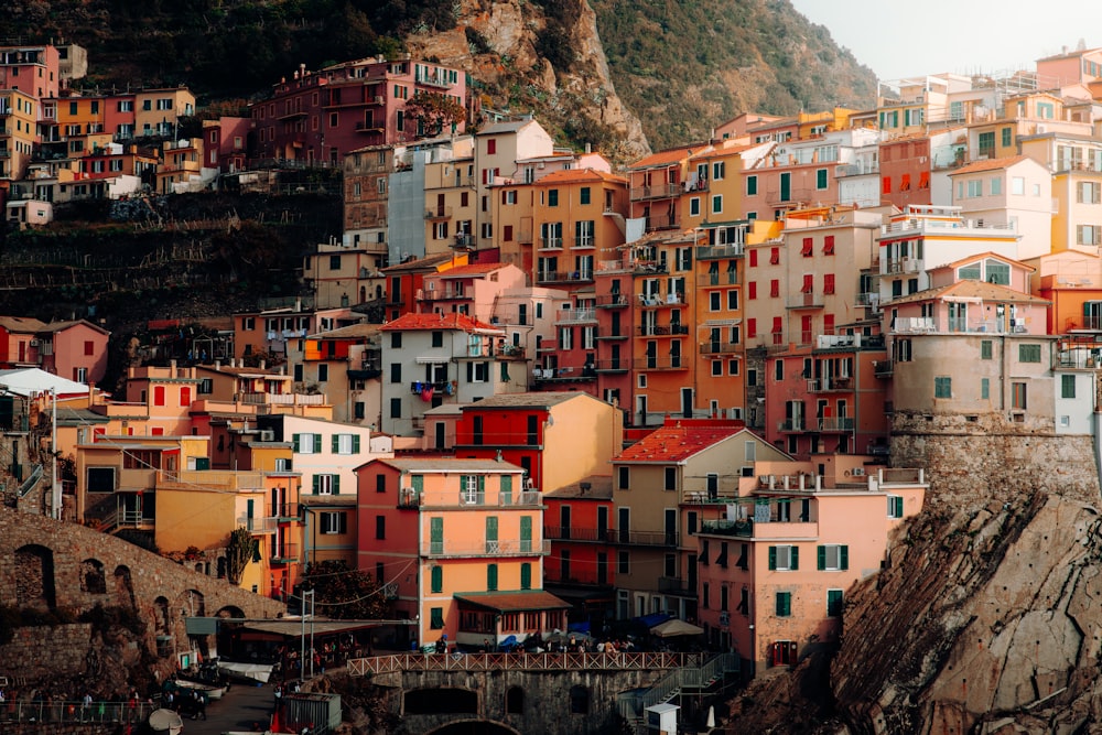 a group of buildings that are on the side of a hill