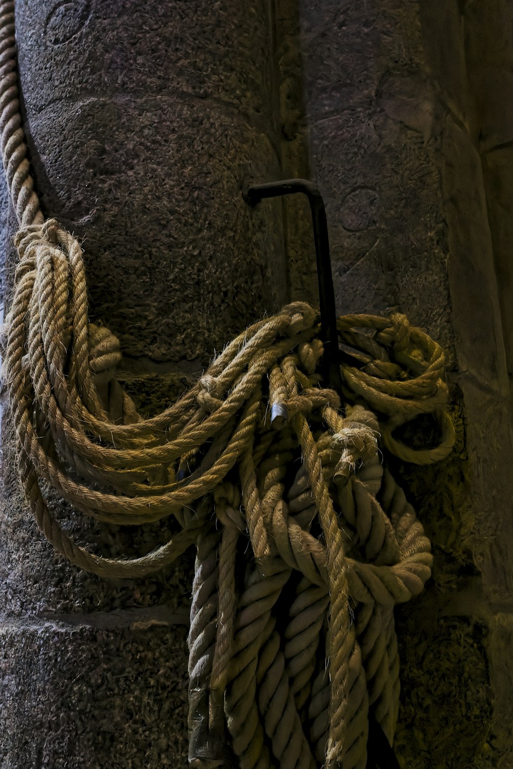 a close up of a rope on a wall