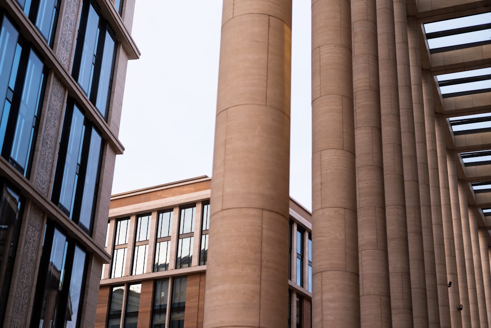 a couple of tall buildings sitting next to each other