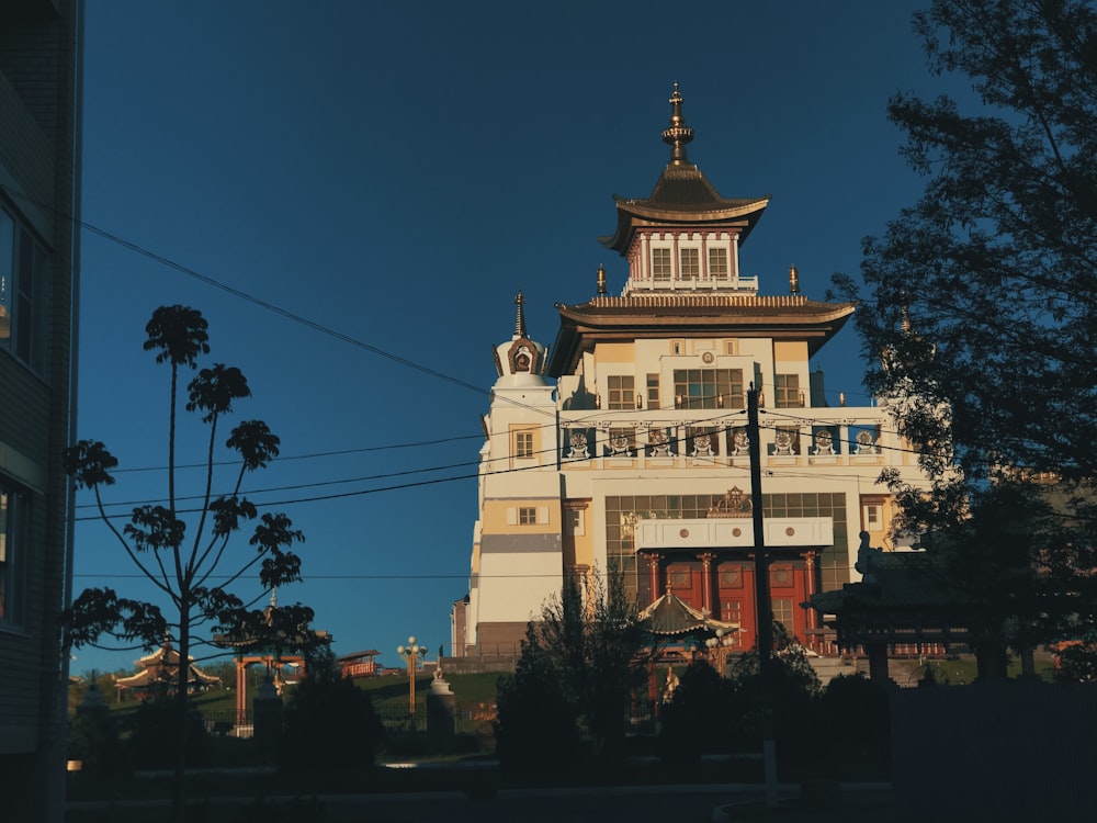 a tall building with a clock on the top of it