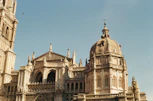 a large building with a clock on the top of it