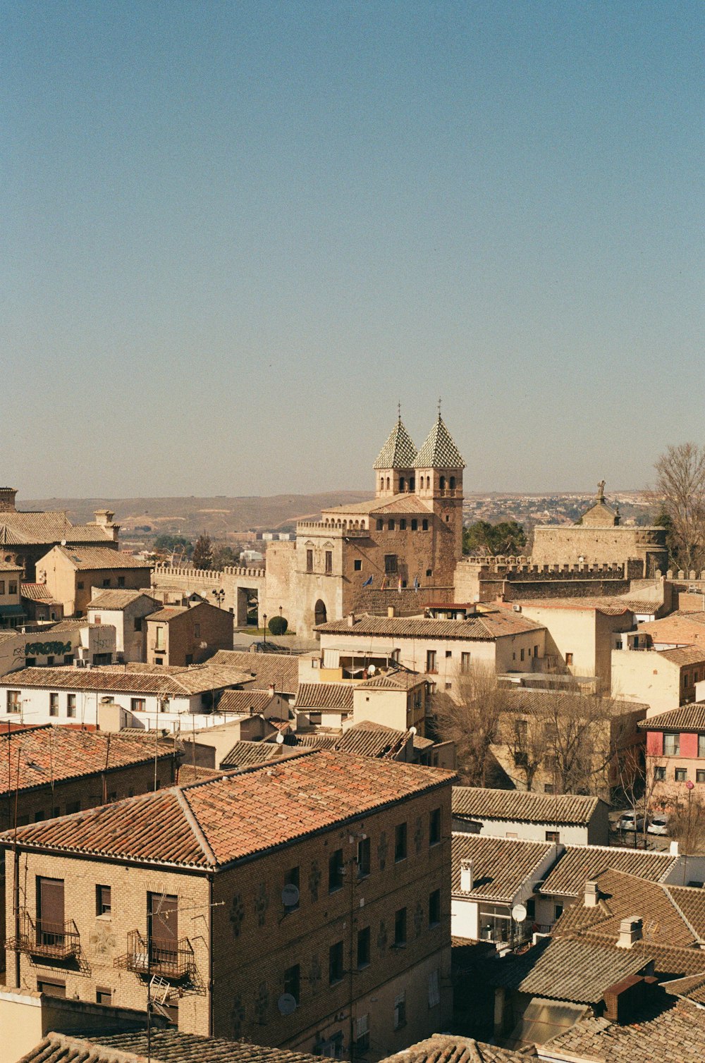 a view of a city with a clock tower