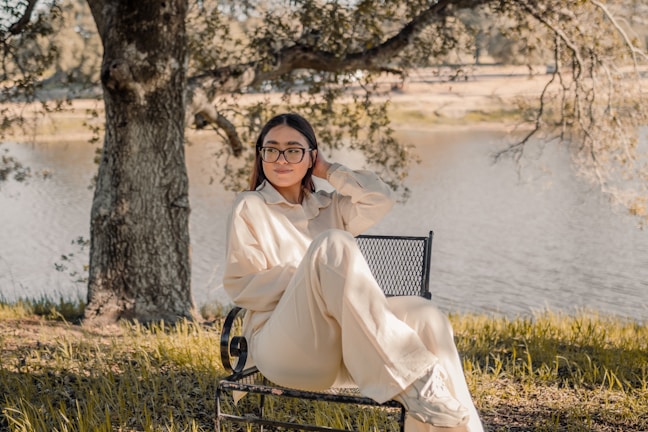 A serene outdoor setting where a coaching session is taking place on a bench.