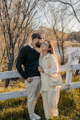 A serene outdoor setting with couples enjoying a peaceful moment together during a retreat.