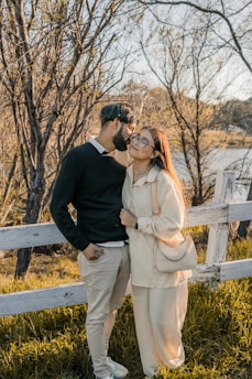 A serene outdoor setting with couples enjoying a peaceful moment together during a retreat.