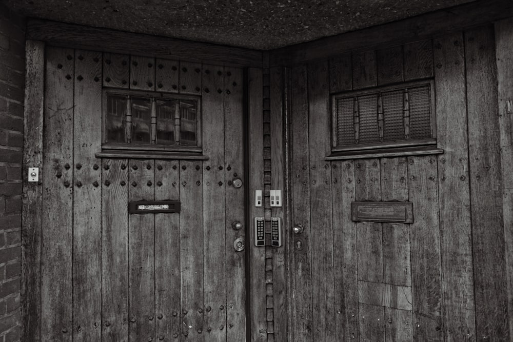 a couple of wooden doors sitting next to each other