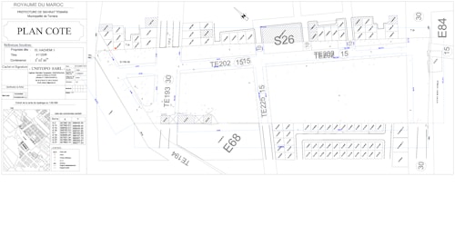 Architectural or urban planning layout with labeled sections and codes. It includes detailed dimensions, various structural elements, streets, and plot numbers. There are also annotations and technical notes.