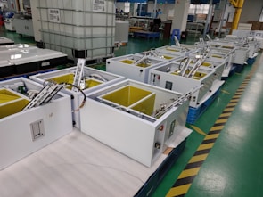 Wide shot of eaglei colour sorter machines lined up in the factory at Kallakurichi