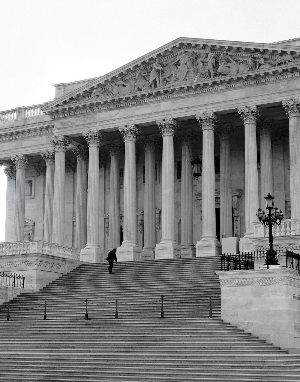 a black and white photo of the steps to the supreme court