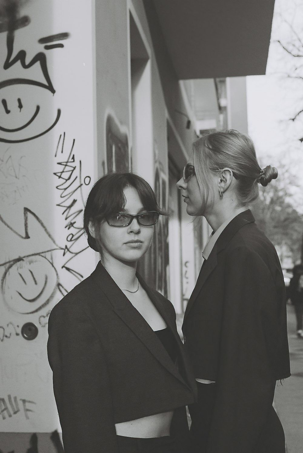 a couple of women standing next to each other