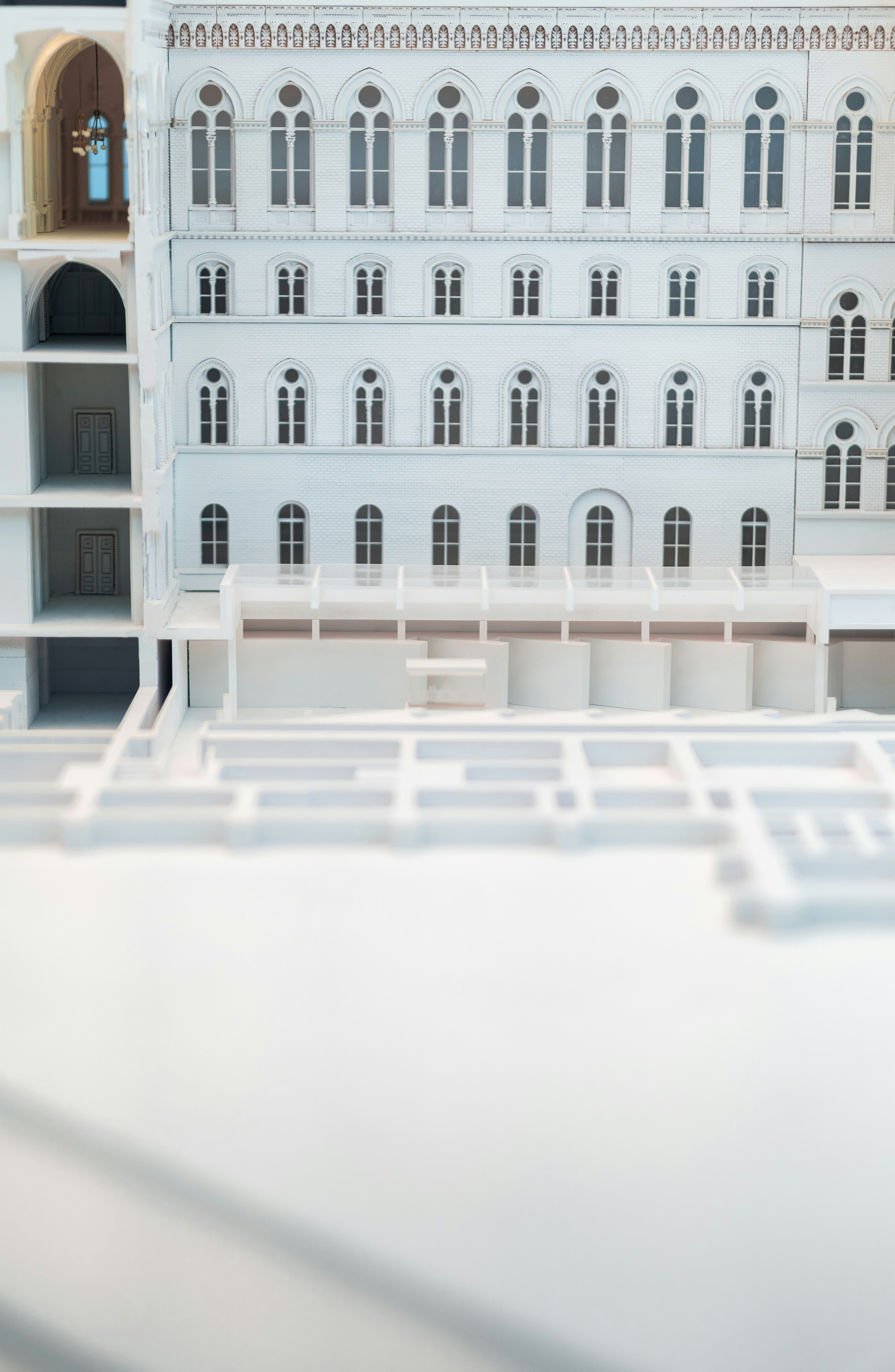 a model of a white building with many windows