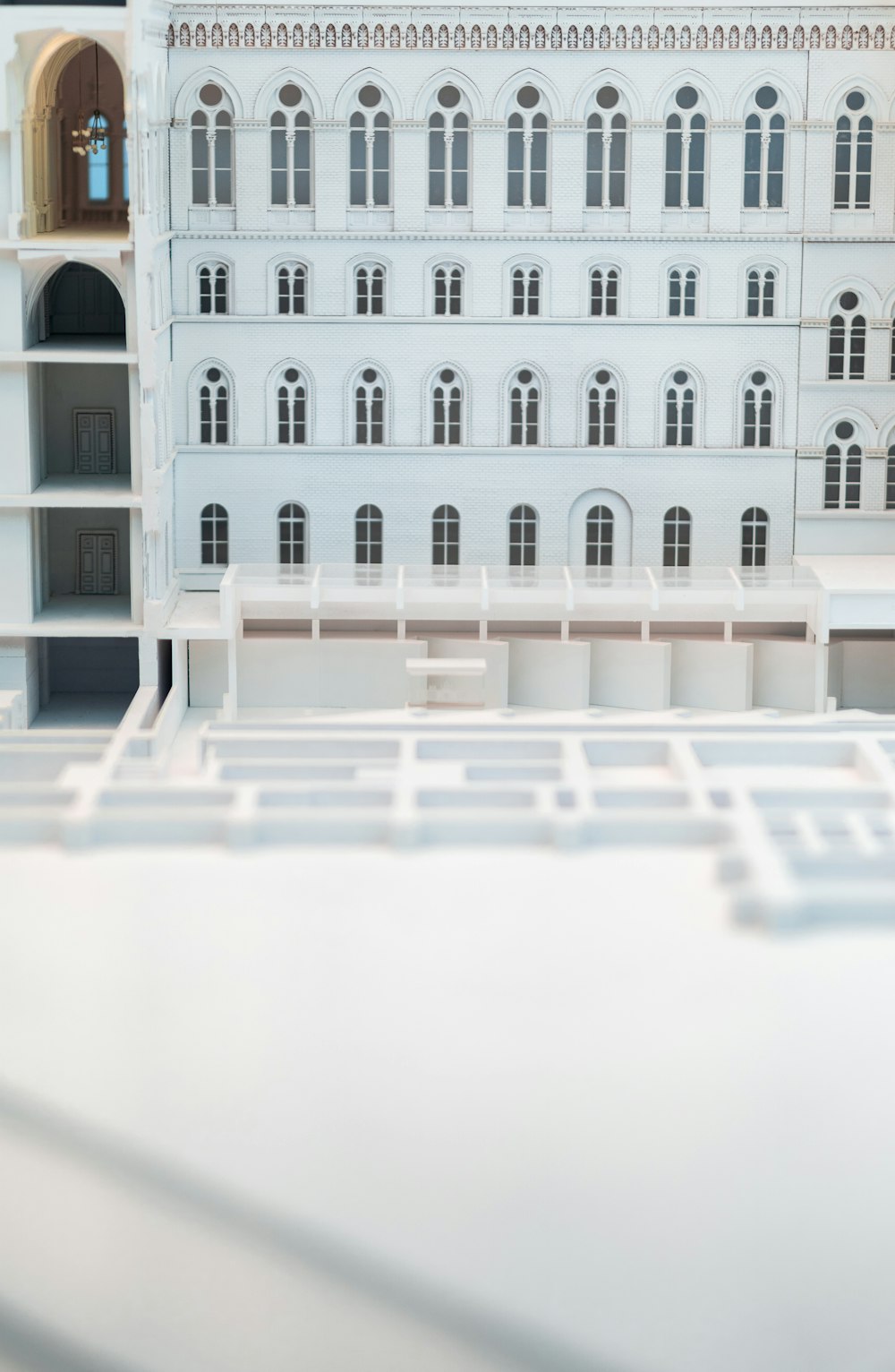 a model of a white building with a lot of windows
