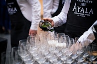 A team of wait staff ready to serve at an event.