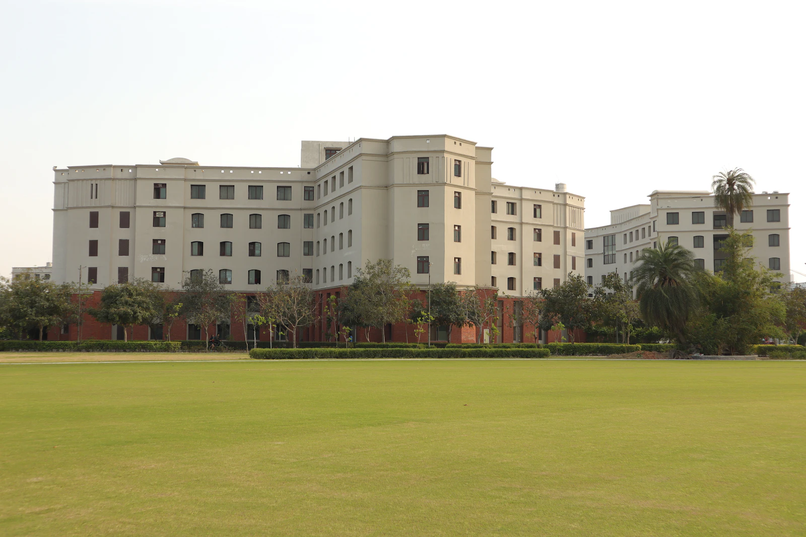 College campus building with a green lawn