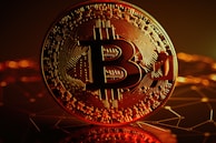 A large, close-up view of a Bitcoin coin with intricate circuit-like patterns on its surface. The background is a dark, abstract representation of a digital network with glowing orange and yellow lights.