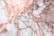 A detailed pattern resembling marble with cracks and veins in shades of white, pink, and brown. The intricate design features a mixture of smooth and rough textures with an organic, natural appearance.