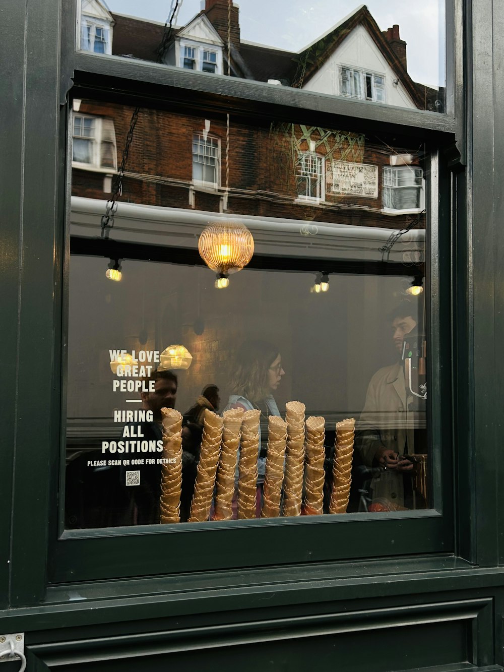 a store window with some cones in front of it