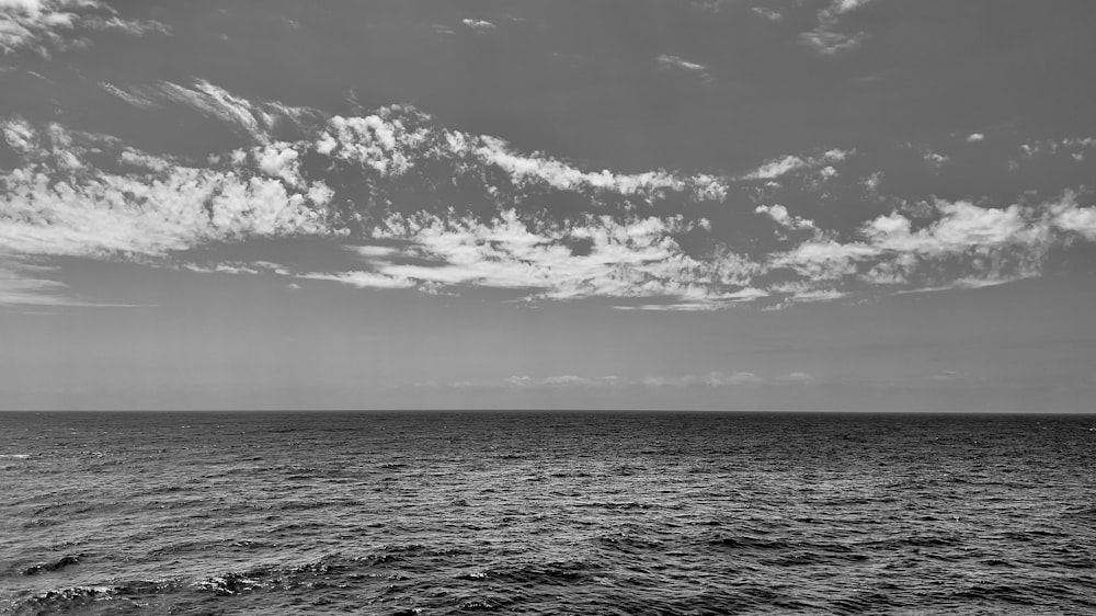 a black and white photo of the ocean