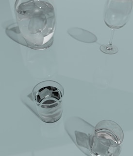 a glass of water and a glass of wine on a table