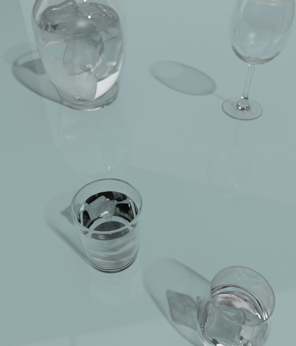 a glass of water and a glass of wine on a table