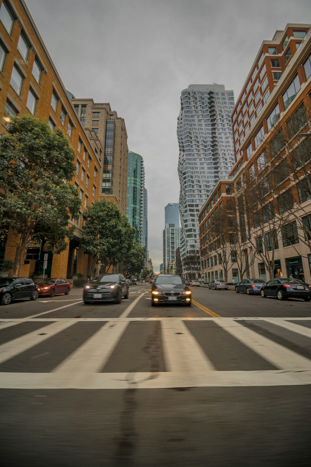 a city street filled with lots of tall buildings