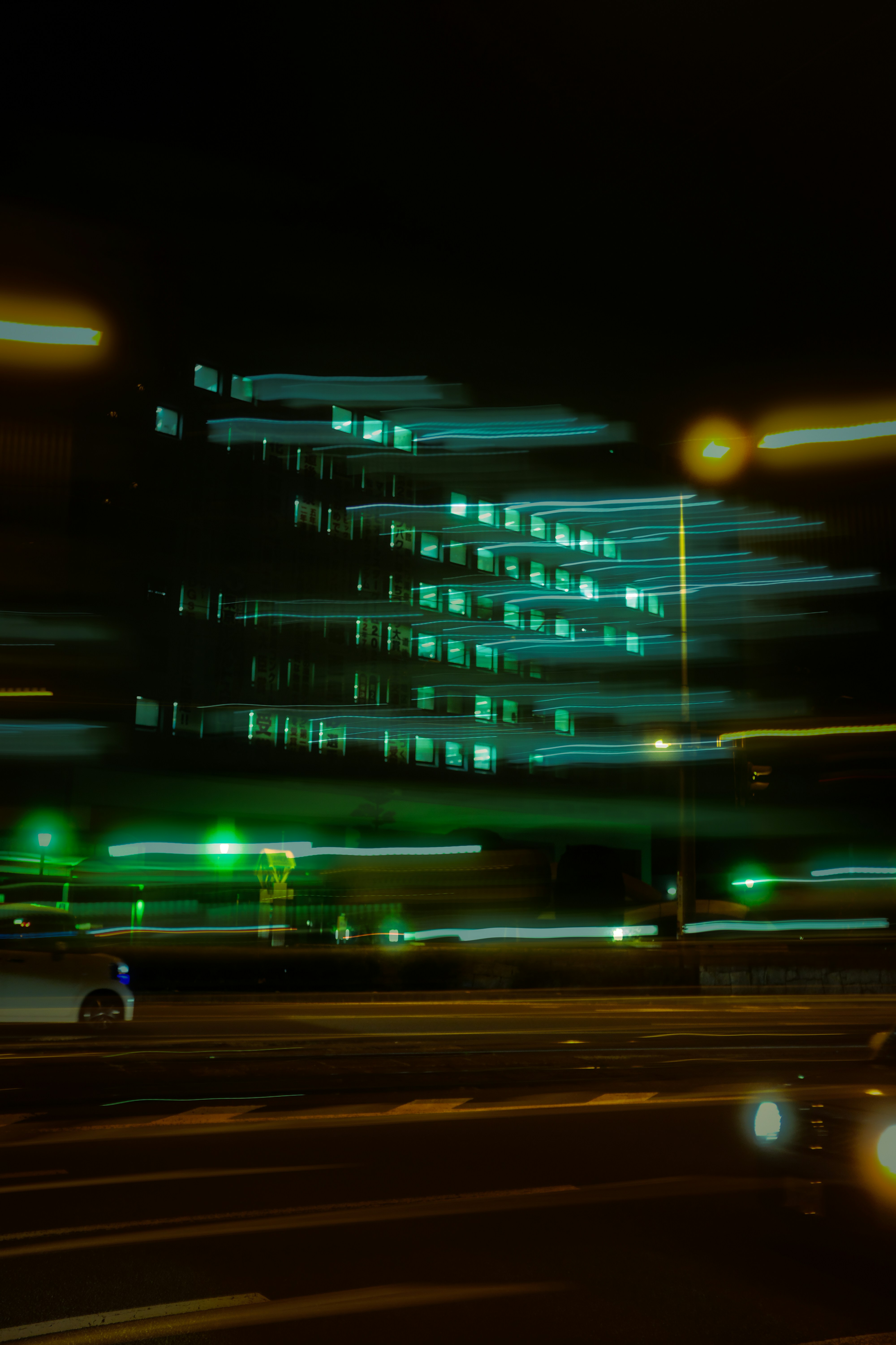 a blurry photo of a building at night