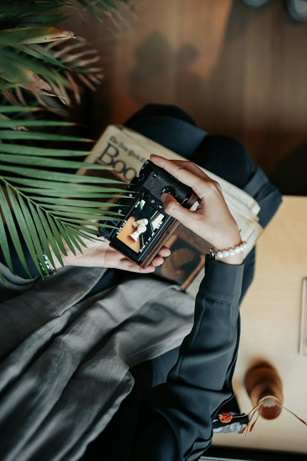 a person holding a book in their hand