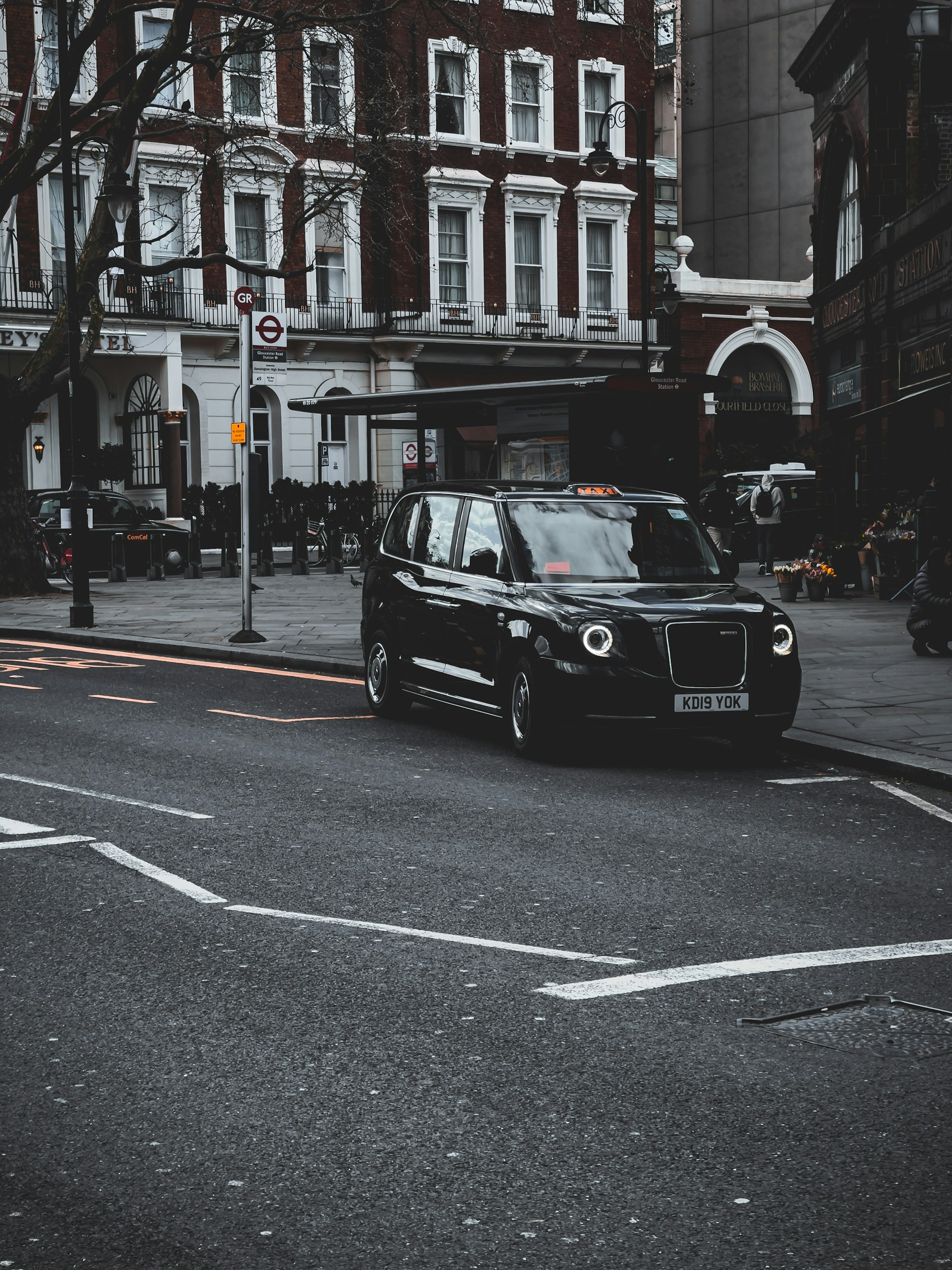 black and brown leather padded tub sofa