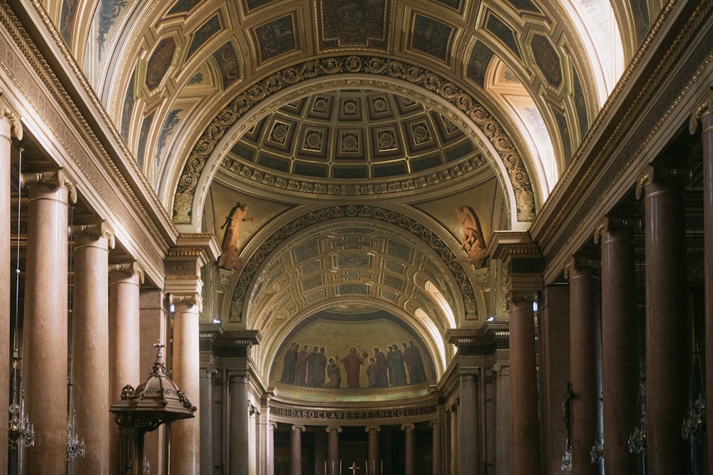 a church with a vaulted ceiling and columns