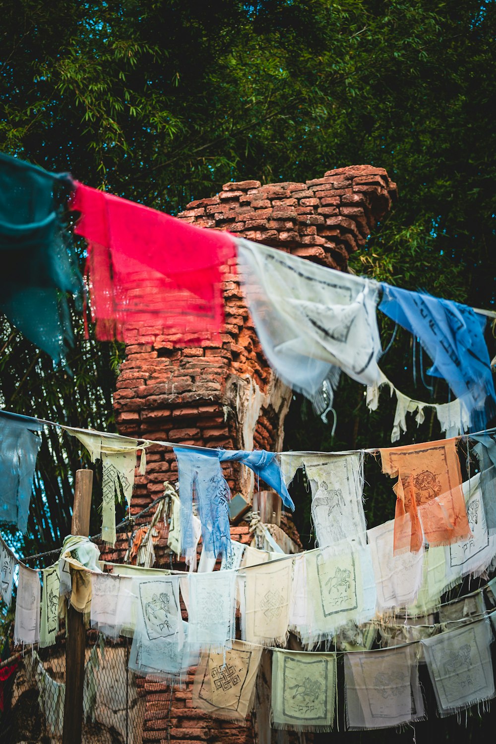 a bunch of clothes hanging on a clothes line