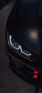 a close up of the front of a black car