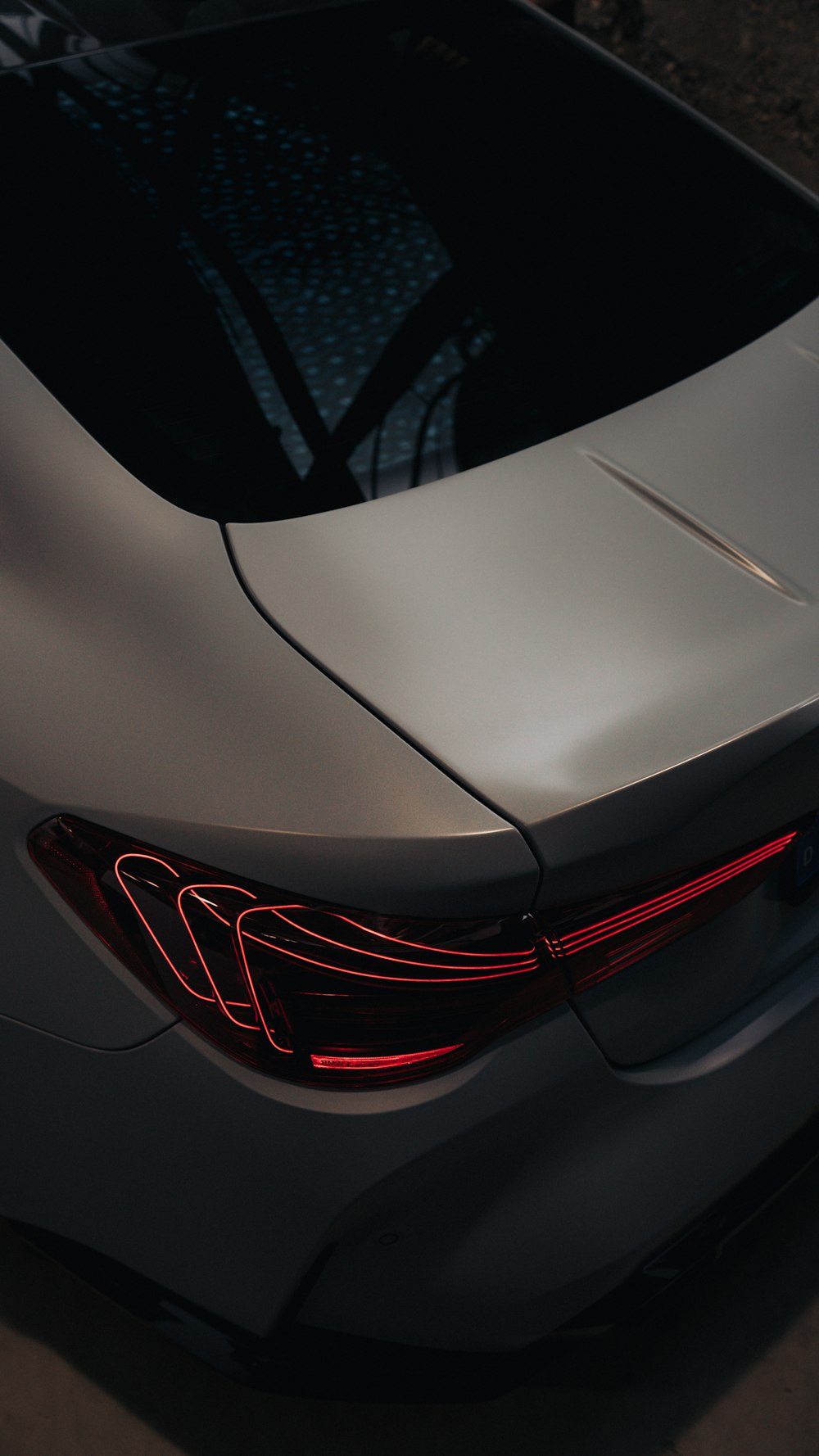 a close up of the tail lights of a car