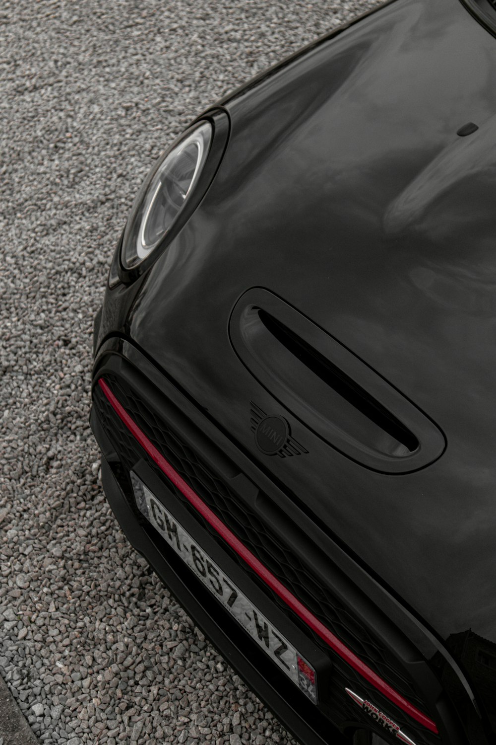 a black sports car parked on the side of the road