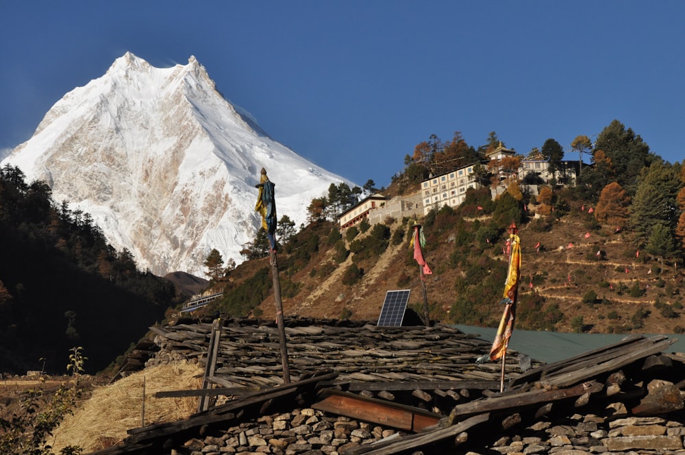 a view of a snow covered mountain in the distance