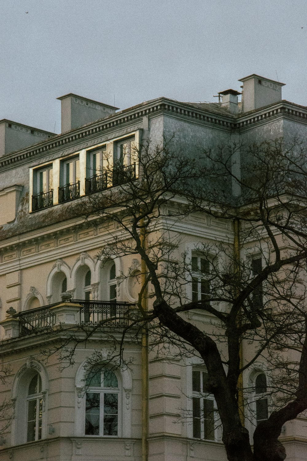 a large building with a clock on the front of it