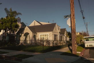 a house with a truck parked in front of it