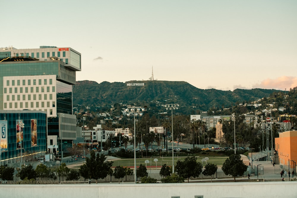 a view of a city with mountains in the background