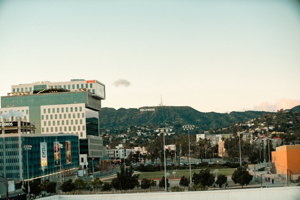 a view of a city with mountains in the background