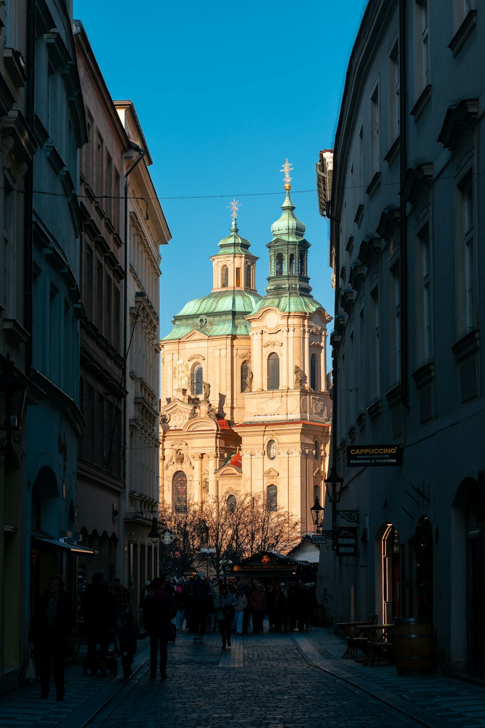 a large building with a green dome on top of it