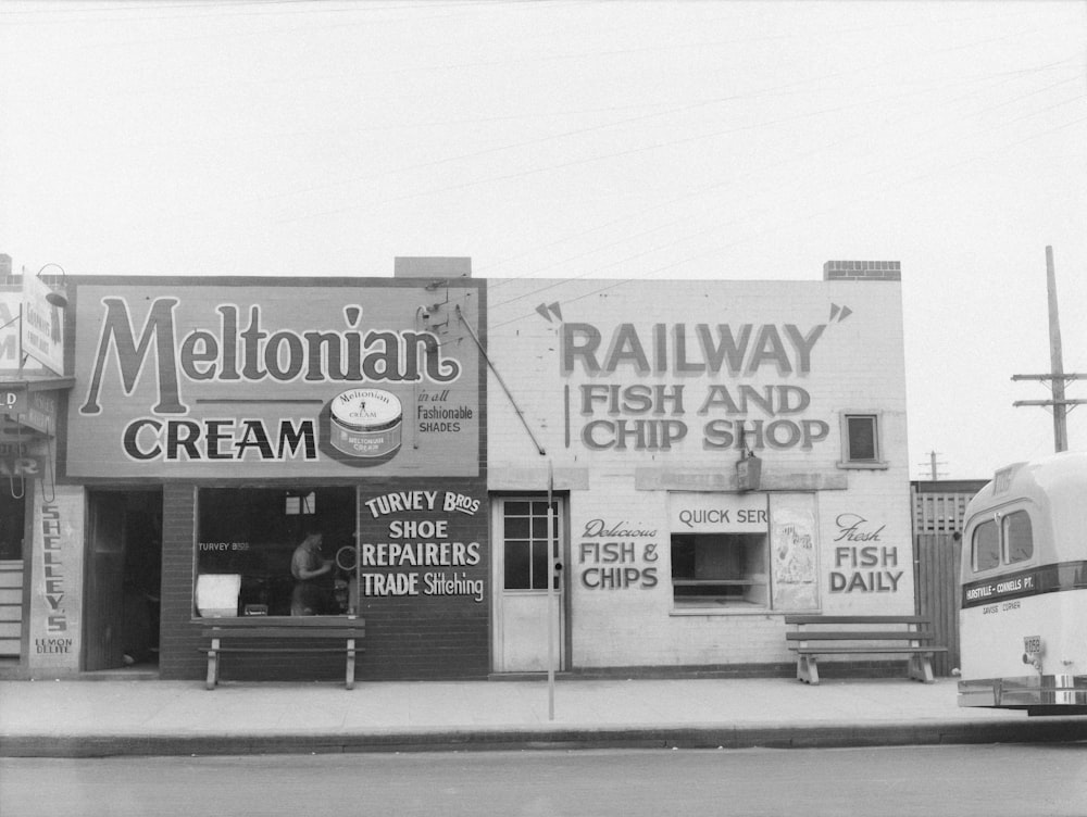 a black and white photo of a train station