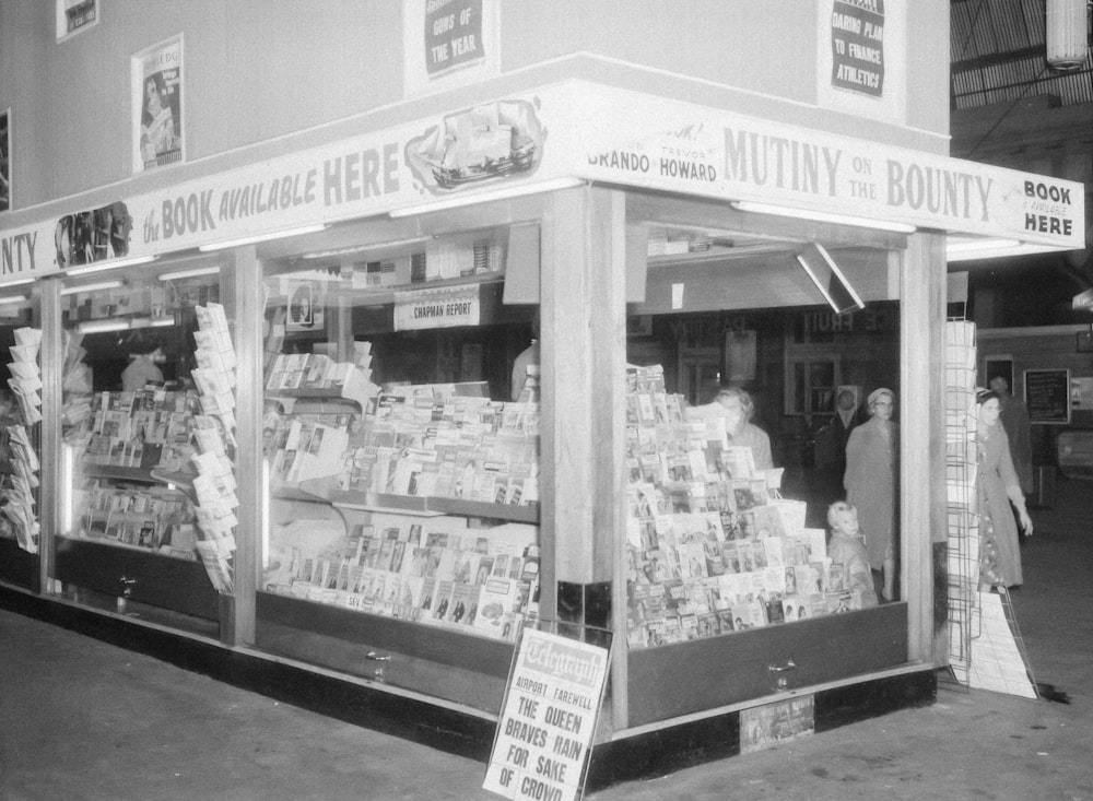 a black and white photo of a book store