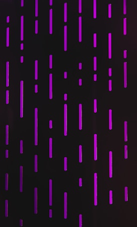 Vertical and horizontal purple neon lines are arranged on a dark background, resembling digital rain or futuristic code patterns.
