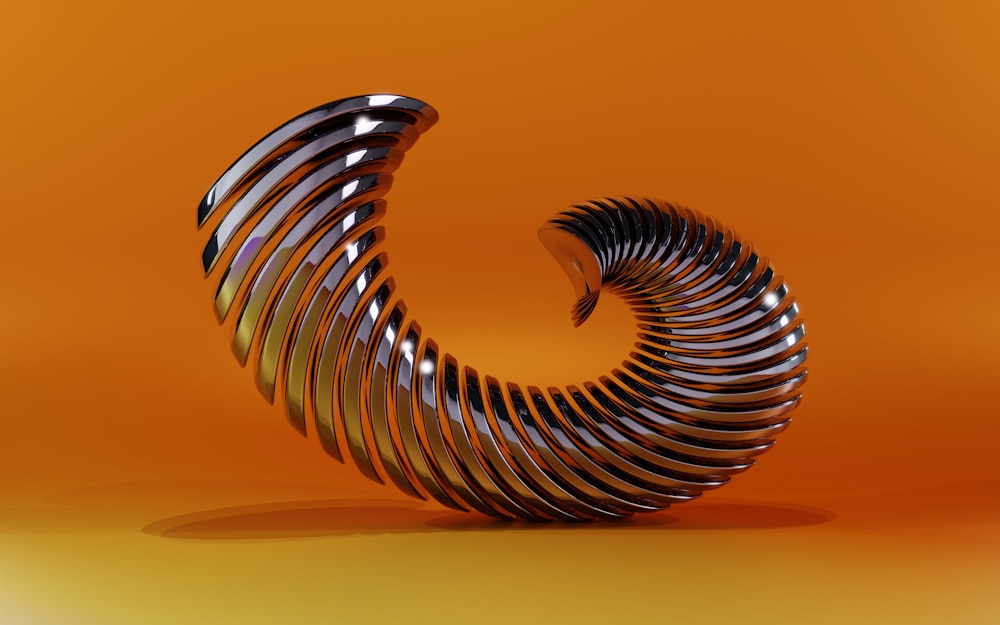 a metal spiral on an orange background