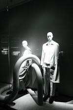 Elegant display of camandeli’s high-end knitwear collection on minimalist mannequins.