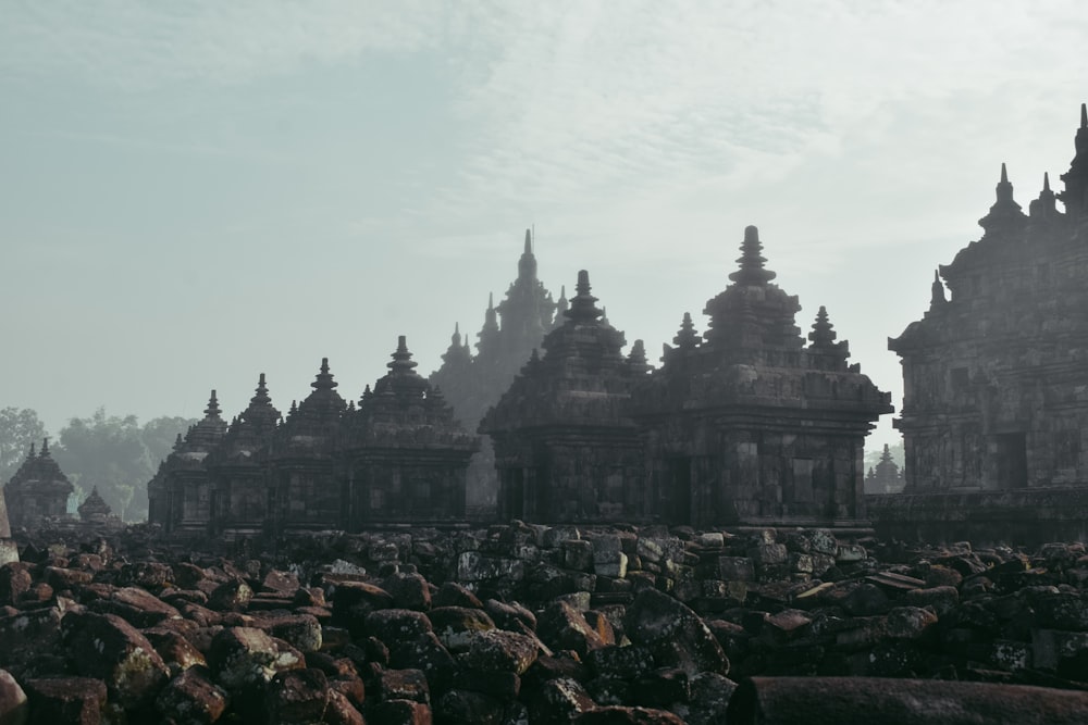 a large group of stone structures in the middle of a field