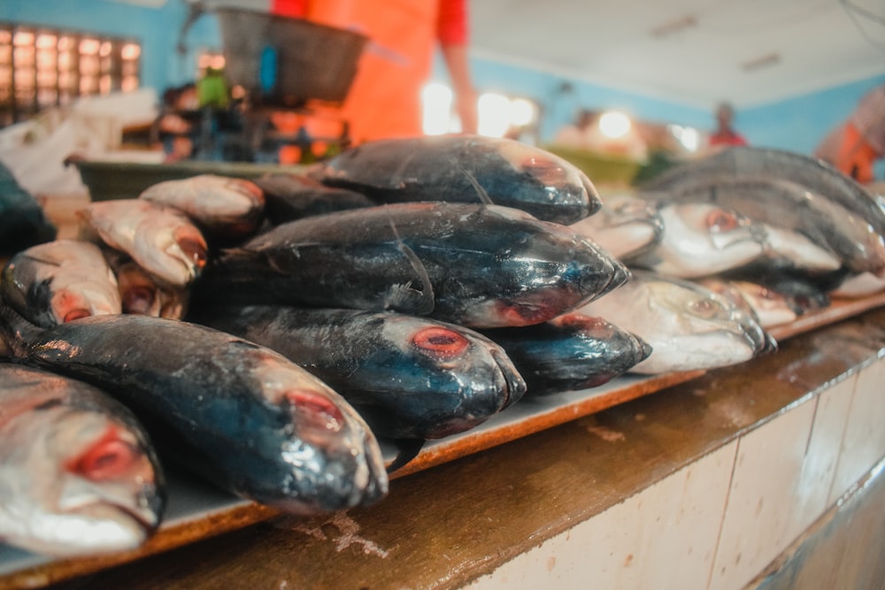 a bunch of fish that are on a table