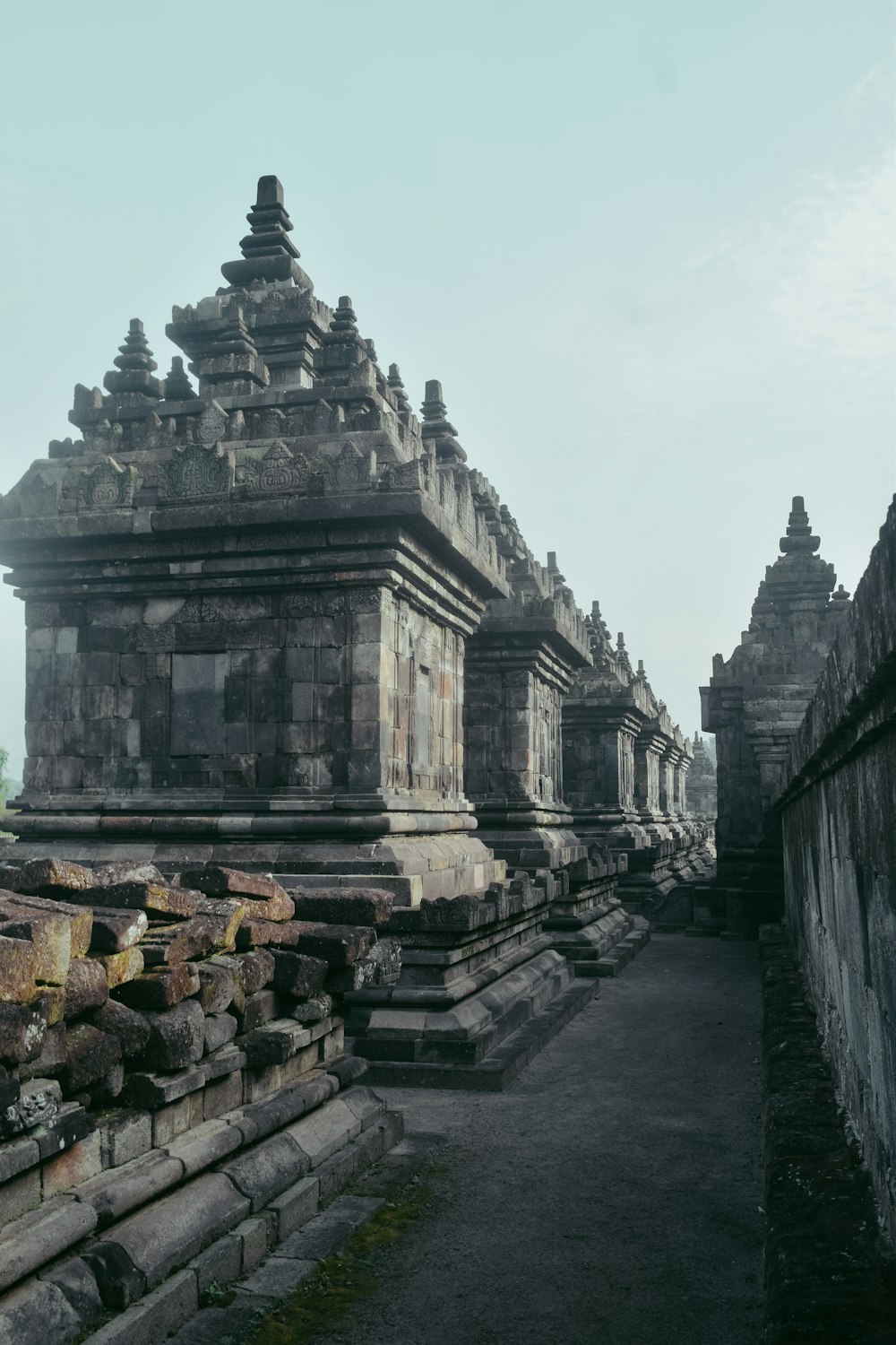 a row of stone buildings sitting next to each other