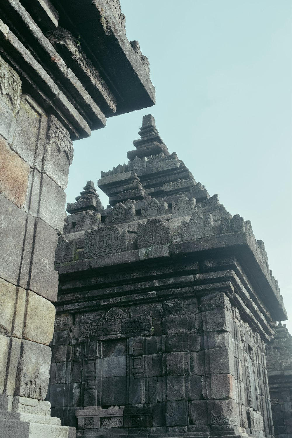 a large stone structure with a sky background