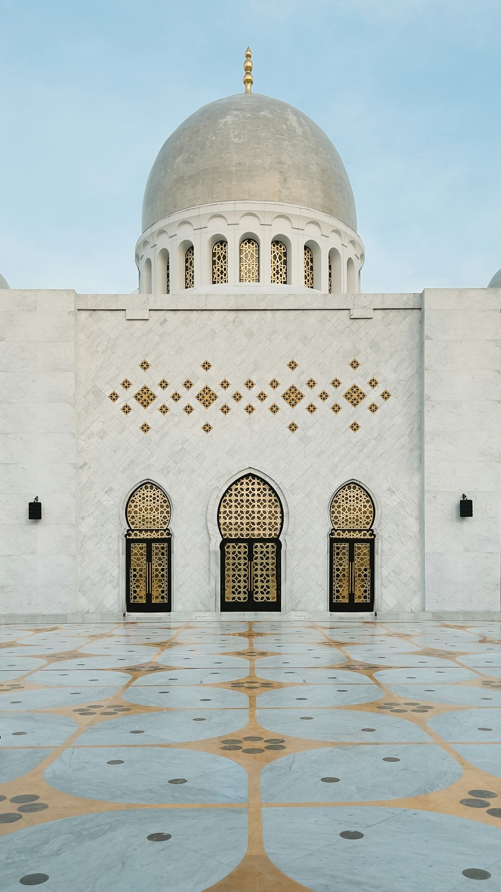 a large white building with a dome on top of it